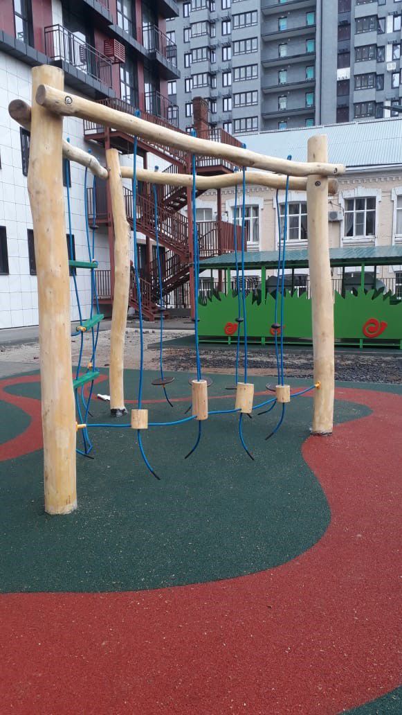 Проект детской игровой площадки в стиле эко на территории жилого комплекса.